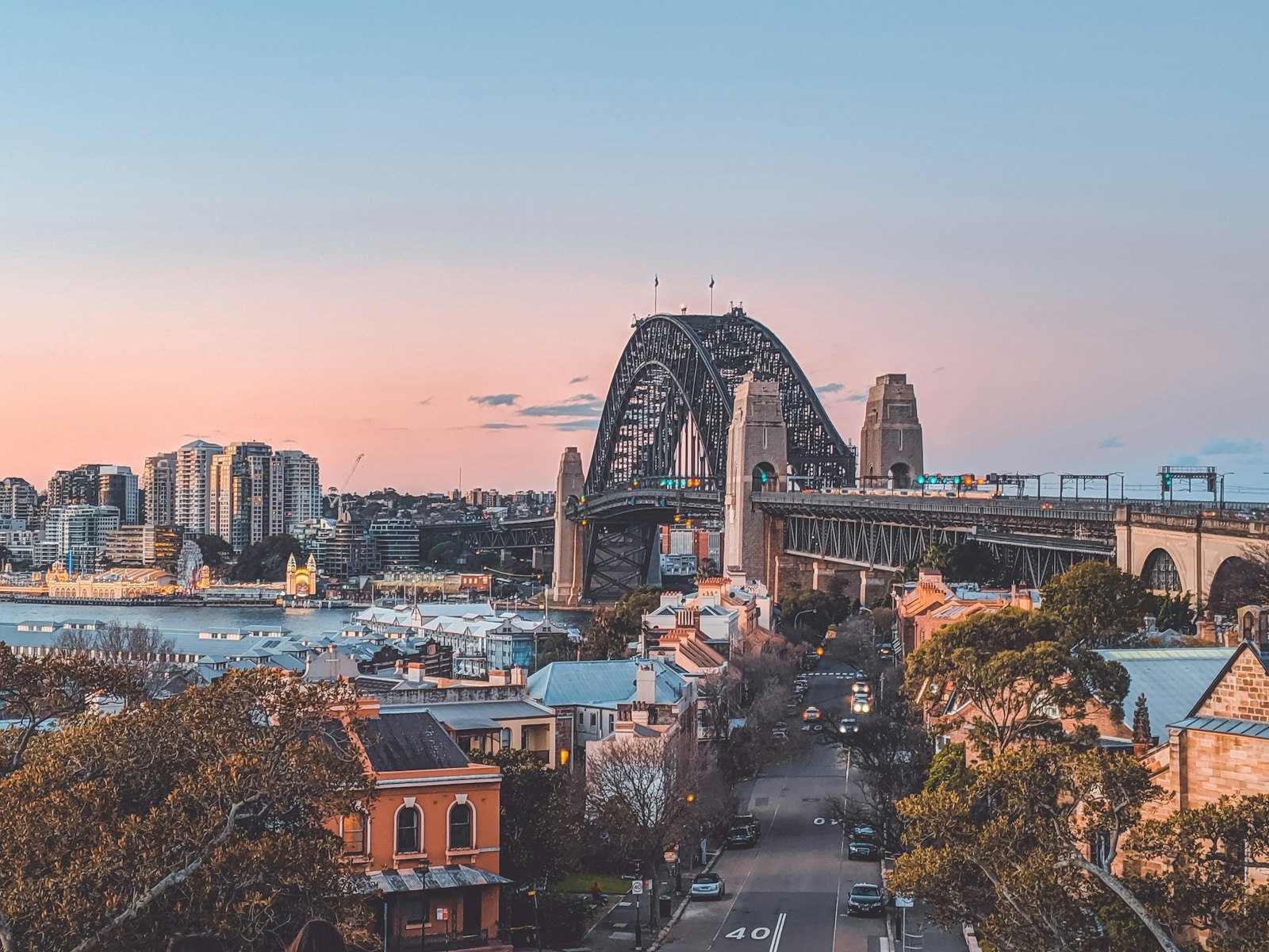 Sydney high-rise buildings and the harbour bridge in daylight